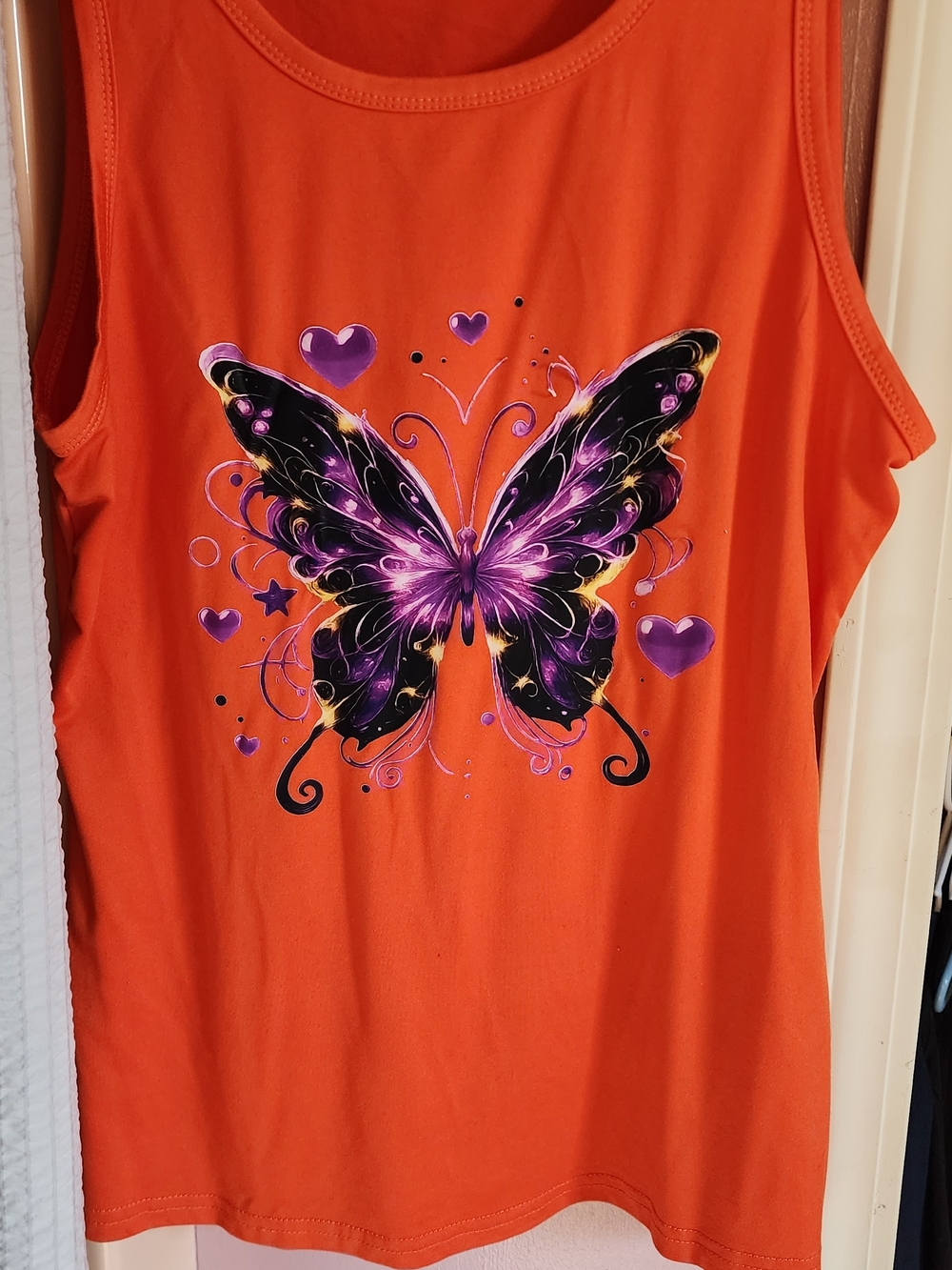 Women’s Orange Tank Top with Purple Butterfly Graphic